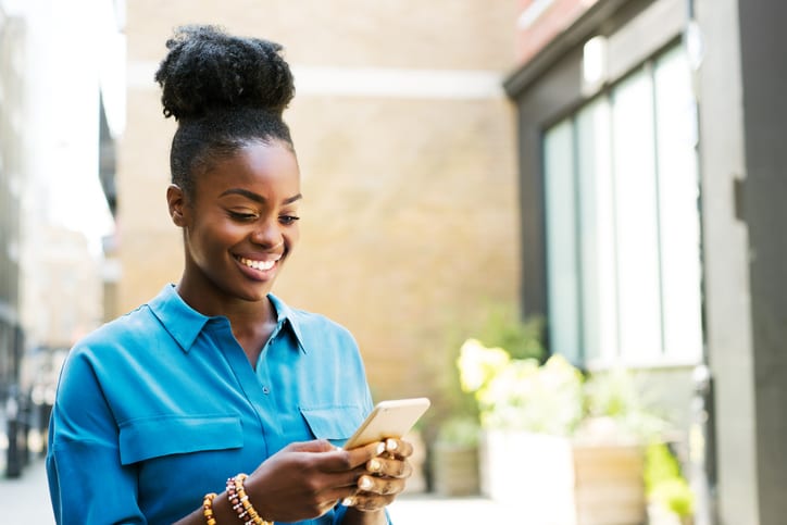 Woman texting on her phone